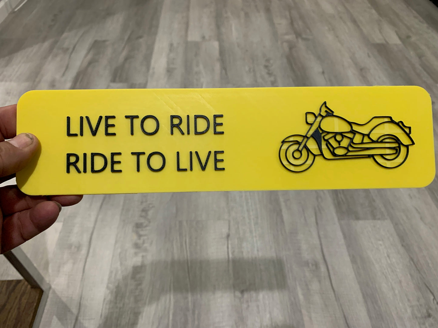 LIVE TO RIDE SIGN